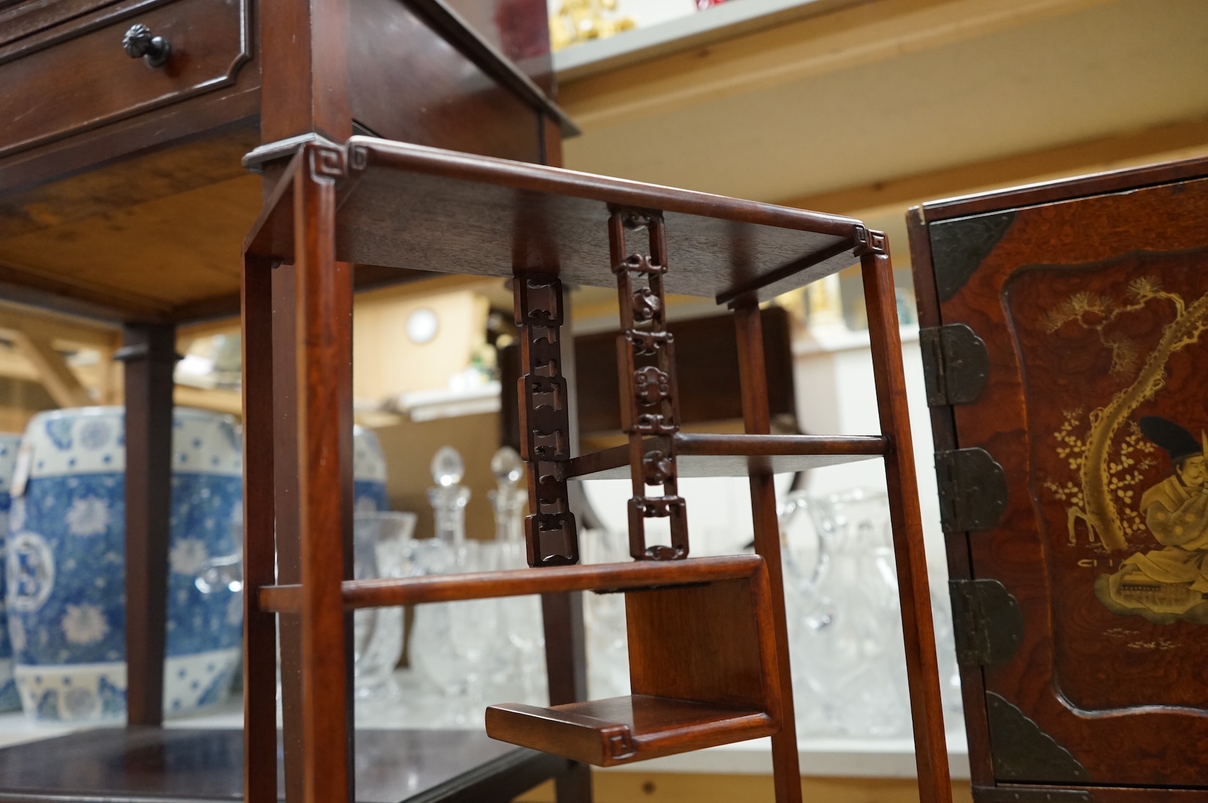 A Japanese lacquered table cabinet and shelves, largest 53.5 x 45cm